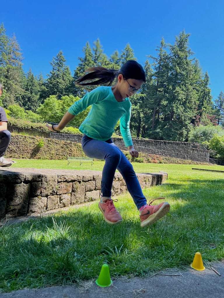 kid-jumping-3-Mt.-Tabor-park-scaled-1.jpeg